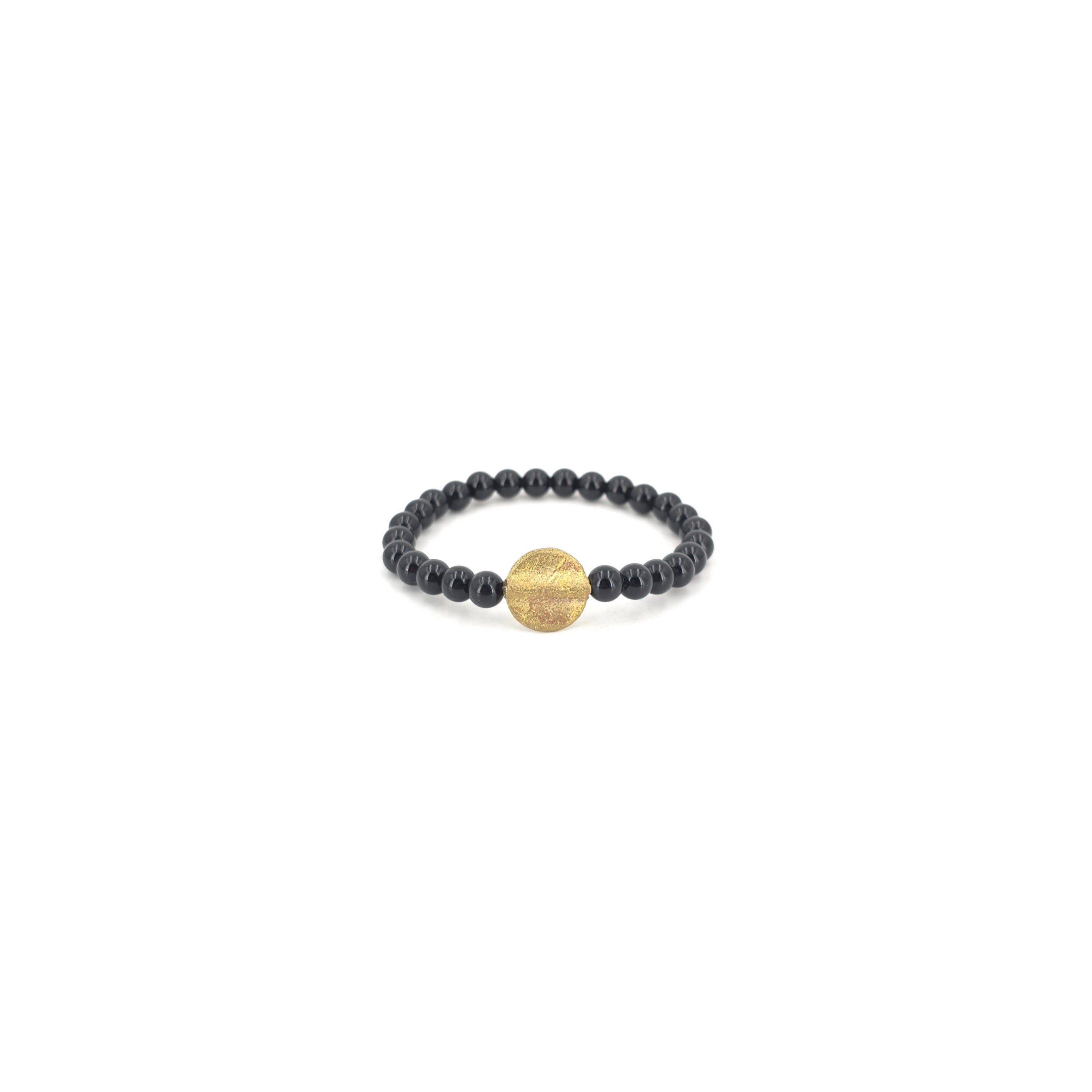 Le petit bracelet noir - 1